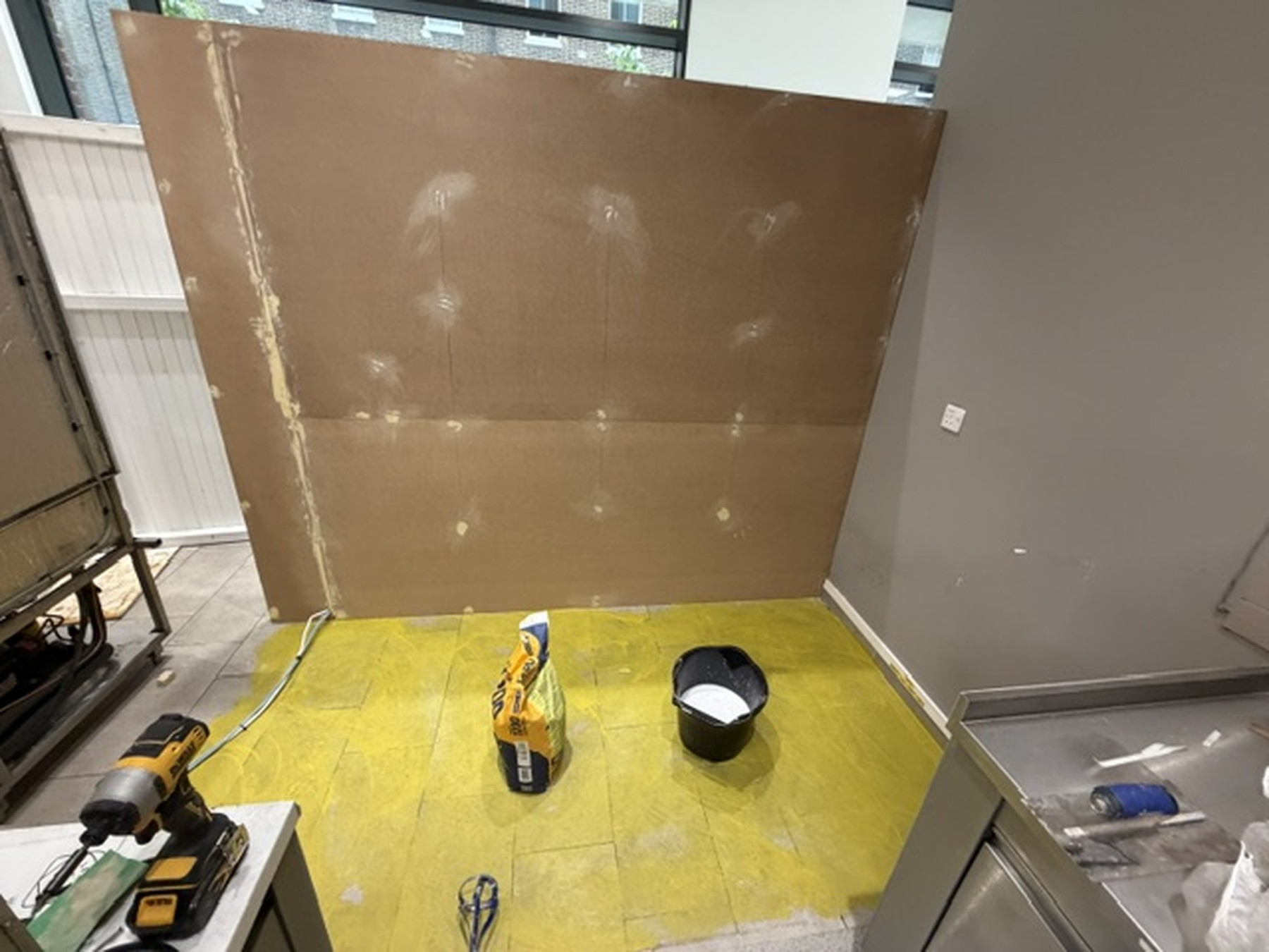 NHS Facility London: Coffee shop refurbishment behind temporary hoarding